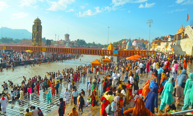 Hindu devotees take a holy dip in Ganges river on the occasion of Sharad and Laxmi purnima or full moon in the town of Haridwar, northern Indian state of Uttarakhand on Oct. 20, 2021.(Photo: Xinhua)