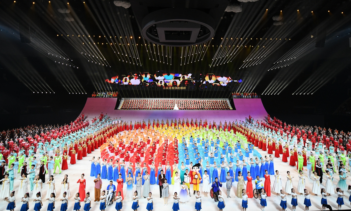 The 11th National Games for Persons with Disabilities and the 8th National Special Olympic Games open on Friday in Xi'an, Northwest China's Shaanxi Province. A total of 4,484 athletes will participate in these Games that will run until October 29. It is the first time the two Games will be held in the same city as the National Games of China in the same year. Photo: Xinhua