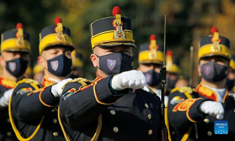 Romanian soldiers attend a ceremony marking Romania's Army Day in Bucharest, capital of Romania, Oct. 25, 2021.(Photo: Xinhua)