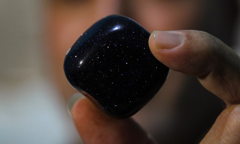 Salah al-Kahlout displays a rare stone at his center in Jabalia refugee camp in northern Gaza Strip, on Oct. 13, 2021. (Photo: Xinhua)