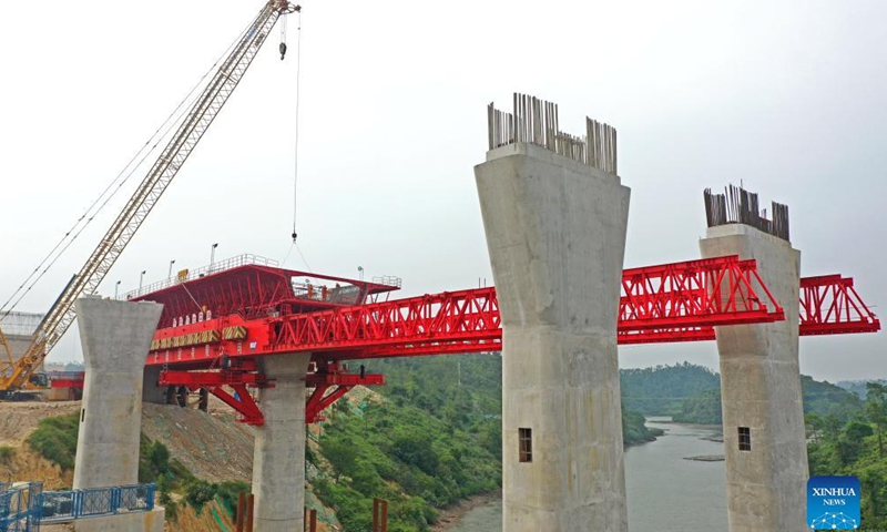 Aerial photo taken on Oct. 28, 2021 shows the construction site of the Longmen Bridge in Qinzhou City, south China's Guangxi Zhuang Autonomous Region.Photo:Xinhua