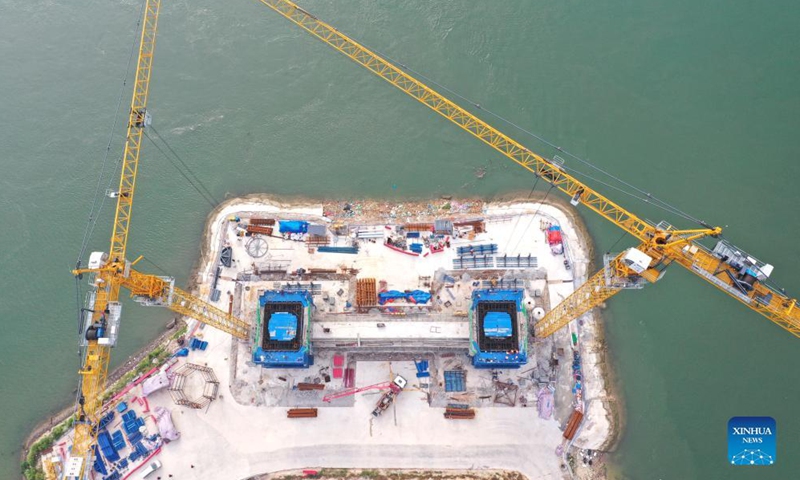 Aerial photo taken on Oct. 28, 2021 shows the construction site of the Longmen Bridge in Qinzhou City, south China's Guangxi Zhuang Autonomous Region.Photo:Xinhua