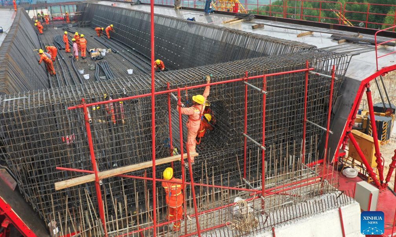 Aerial photo taken on Oct. 28, 2021 shows the construction site of the Longmen Bridge in Qinzhou City, south China's Guangxi Zhuang Autonomous Region.Photo:Xinhua