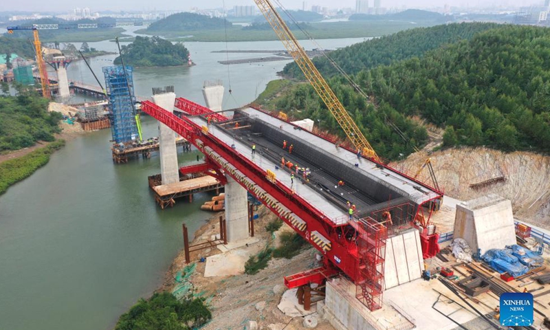 Aerial photo taken on Oct. 28, 2021 shows the construction site of the Longmen Bridge in Qinzhou City, south China's Guangxi Zhuang Autonomous Region.Photo:Xinhua