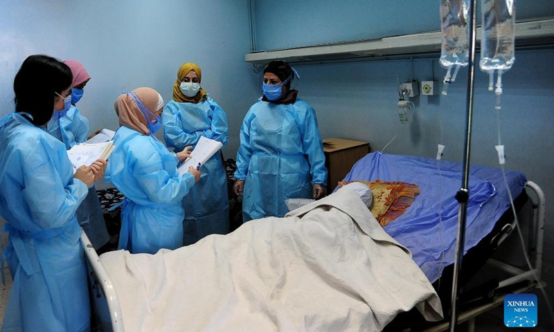 Medical workers treat COVID-19 patients at a hospital in Damascus, Syria, on Nov. 7, 2021.Photo:Xinhua