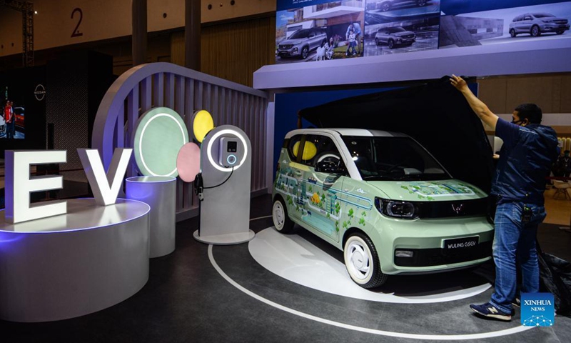 A worker prepares before the opening of the Gaikindo Indonesia International Auto Show (GIIAS) at Indonesia Convention Exhibition (ICE) in Tangerang, Indonesia on Nov. 11, 2021. The GIIAS opened here Thursday and will last till Nov. 21. (Xinhua/Agung Kuncahya B.)
