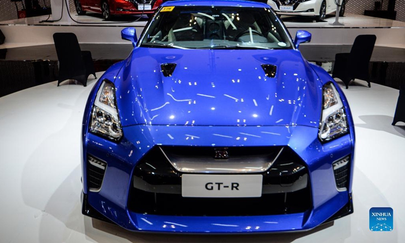 Vehicles are displayed before the opening of the Gaikindo Indonesia International Auto Show (GIIAS) at Indonesia Convention Exhibition (ICE) in Tangerang, Indonesia on Nov. 11, 2021. The GIIAS opened here Thursday and will last till Nov. 21. (Xinhua/Agung Kuncahya B.)