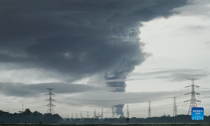 Thick smoke caused by a fire at an oil refinery tank are seen in Cilacap, Central Java, Indonesia, Nov. 14, 2021.Photo: Xinhua