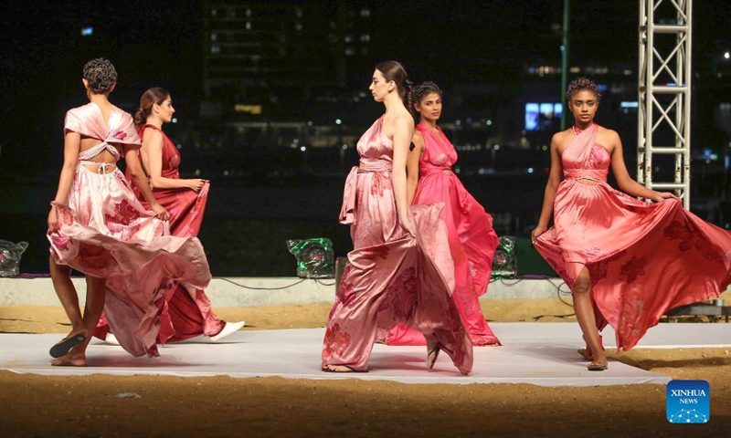 Models present creations during Colombo Fashion Week in Colombo, Sri Lanka, Nov. 13, 2021. Photo: Xinhua