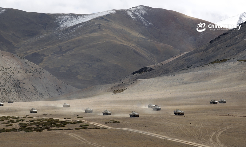 Armored vehicles attached to a division under the PLA Xinjiang Military Command advance to engage mock enemy positions during a live-fire test in late October, 2021. The training exercise was conducted on the Karakoram Plateau at about 4,500 meters above sea level, with an annual average temperature below -10°C. (eng.chinamil.com.cn/Photo by/ Liu Yong, Li Kang, Zhang Li, Shuai Lijian and Yan Shiqiang)