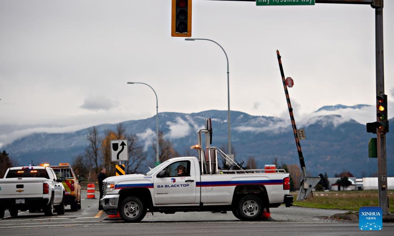 A road is closed due to floods caused by rainstorms in Abbotsford, Canada, Nov. 18, 2021. Incessant rainfall in the British Columbia brought floods to Abbotsford and the Fraser Valley that resulted in the provincial premier declaring a state of emergency. (Photo by Andrew Soong/Xinhua)