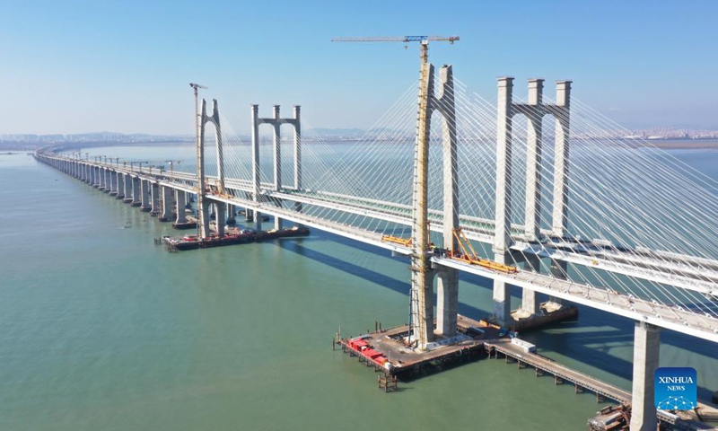 Aerial photo taken on Nov. 30, 2021 shows a view of Quanzhou Bay cross-sea bridge of the Fuzhou-Xiamen high-speed railway in southeast China's Fujian Province. (Xinhua/Lin Shanchuan)