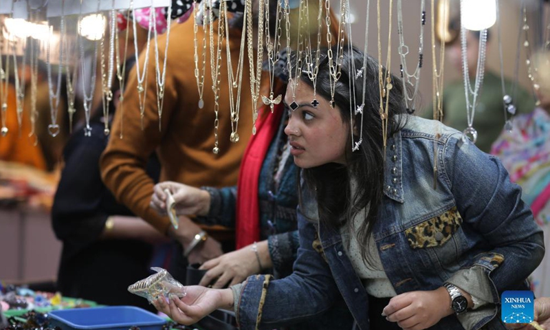 A woman shops for jewellery during the Punjab International Trade Expo (PITEX) in Amritsar, India's northern state Punjab, on Dec 2, 2021. International traders participate in the PITEX 2021 here from Dec 2 to Dec 6.Photo:Xinhua