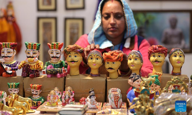 An exhibitor displays products during the Punjab International Trade Expo (PITEX) in Amritsar, India's northern state Punjab, on Dec. 2, 2021. International traders participate in the PITEX 2021 here from Dec 2 to Dec 6. Photo:Xinhua