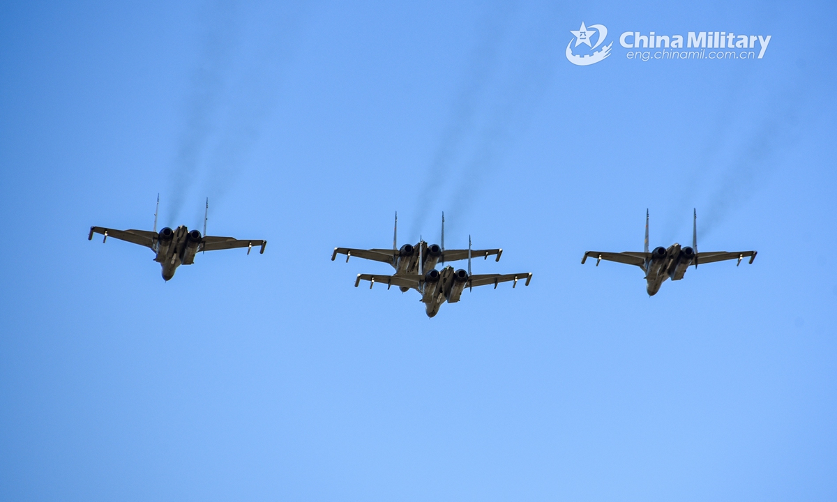 Fighter jets attached to an aviation brigade of the air force under the PLA Eastern Theater Command fly in diamond formation during a round-the-clock flight training exercise on November 26, 2021Photo:China Military