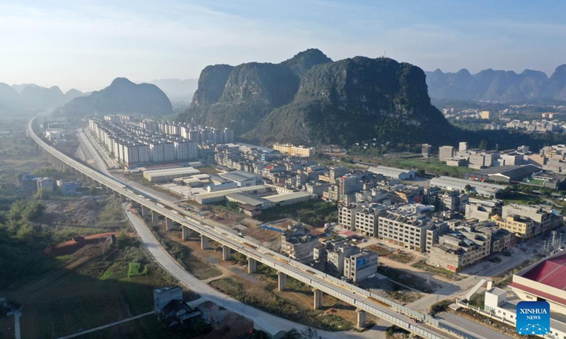 Aerial photo taken on Dec. 1, 2021 shows highway and railway in Du'an Yao Autonomous County, south China's Guangxi Zhuang Autonomous Region.Photo:Xinhua