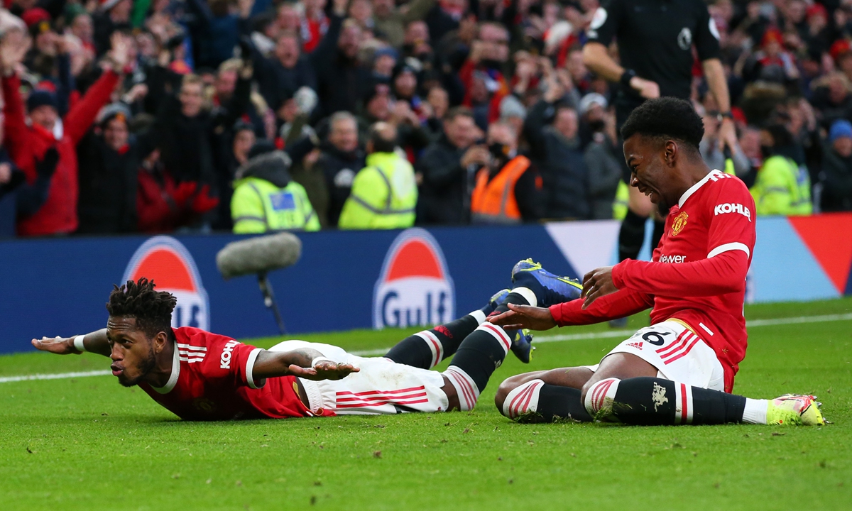 Fred (left) of Manchester United celebrates after scoring their side's first goal during the Premier League match against Crystal Palace at Old Trafford on December 5, 2021 in Manchester, England. Photo: VCG