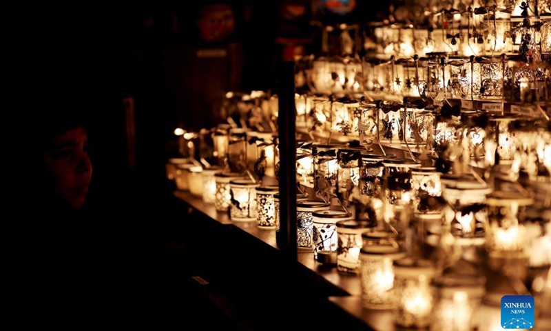 Christmas lights are seen on a booth at 2021 Christmas By The River in London, Britain, Dec. 4, 2021.Photo:Xinhua