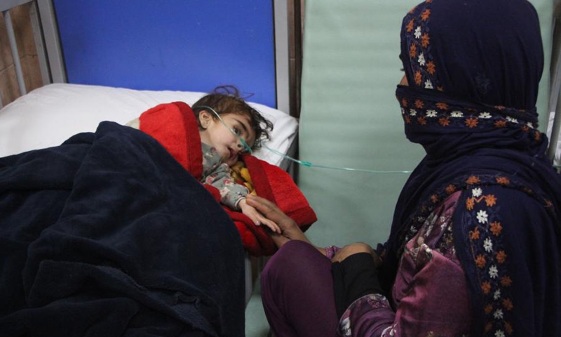 An Afghan child receives medical treatment at a local hospital in Kabul, capital of Afghanistan, Nov. 23, 2021.(Photo: Xinhua)