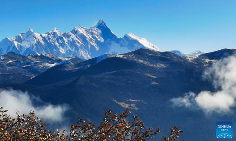 Photo taken on Dec 16, 2021 with a mobile phone shows Mount Namjagbarwa in Nyingchi, southwest China's Tibet Autonomous Region.Photo:Xinhua