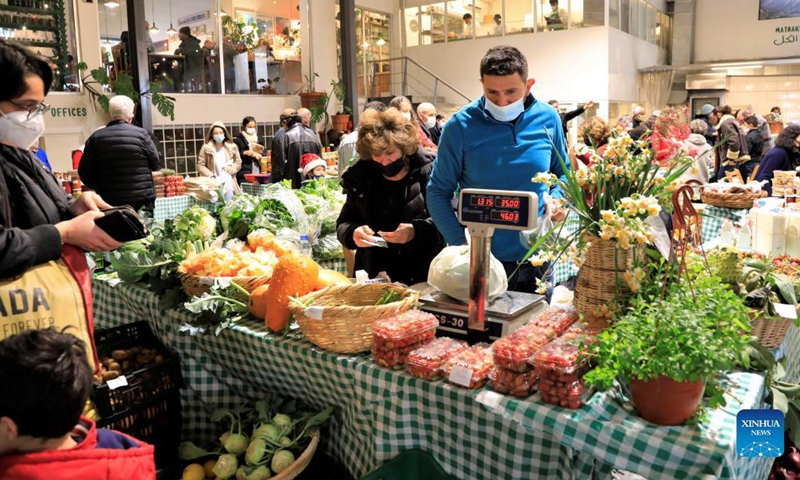 People visit Souk El Tayeb farmers market in Beirut, Lebanon, on Dec. 18, 2021.Photo:Xinhua