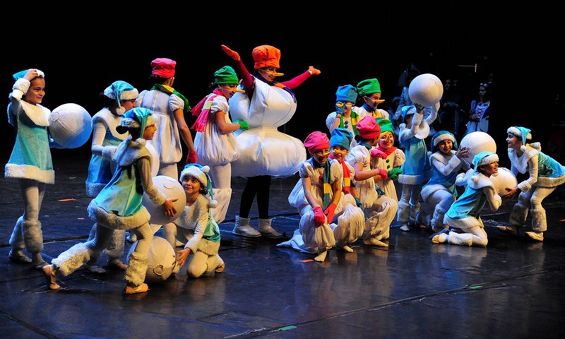 Children stage a musical performance ahead of the Christmas and New Year celebrations in Damascus, Syria, Dec. 21, 2021.(Photo: Xinhua)