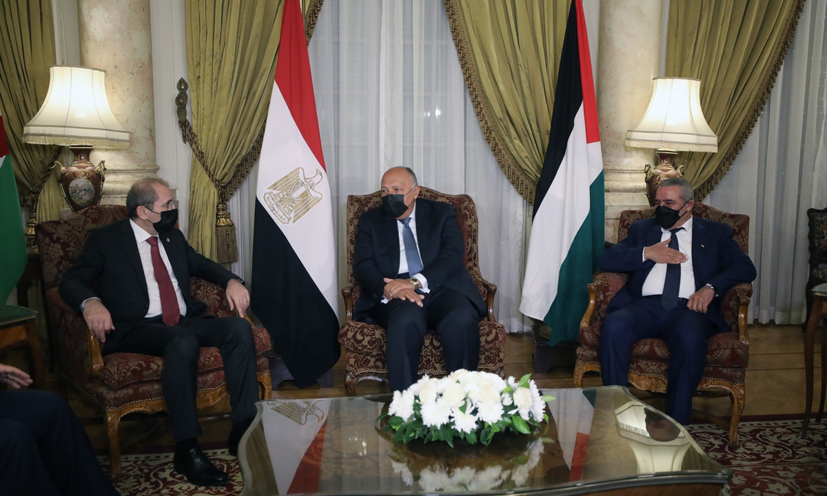 Egyptian Foreign Minister Sameh Shoukry (center) meets with Jordan's Foreign Affairs Minister Ayman Safadi (left) and Hussein Al-Sheikh, head of the General Authority of Civil Affairs of the Palestinian Authority in Cairo, Egypt, December 27, 2021. Egypt is hosting a ministerial meeting with Jordan and the Palestinian authority to discuss recent developments in the Palestinian issue. Photo: IC