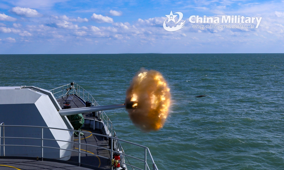 A vessel attached to a frigate flotilla with the navy under the PLA Eastern Theater Command fires its close-in weapons system at mock sea targets during a maritime live-fire training exercise in early December, 2021. (eng.chinamil.com.cn/Photo by Liu Min)