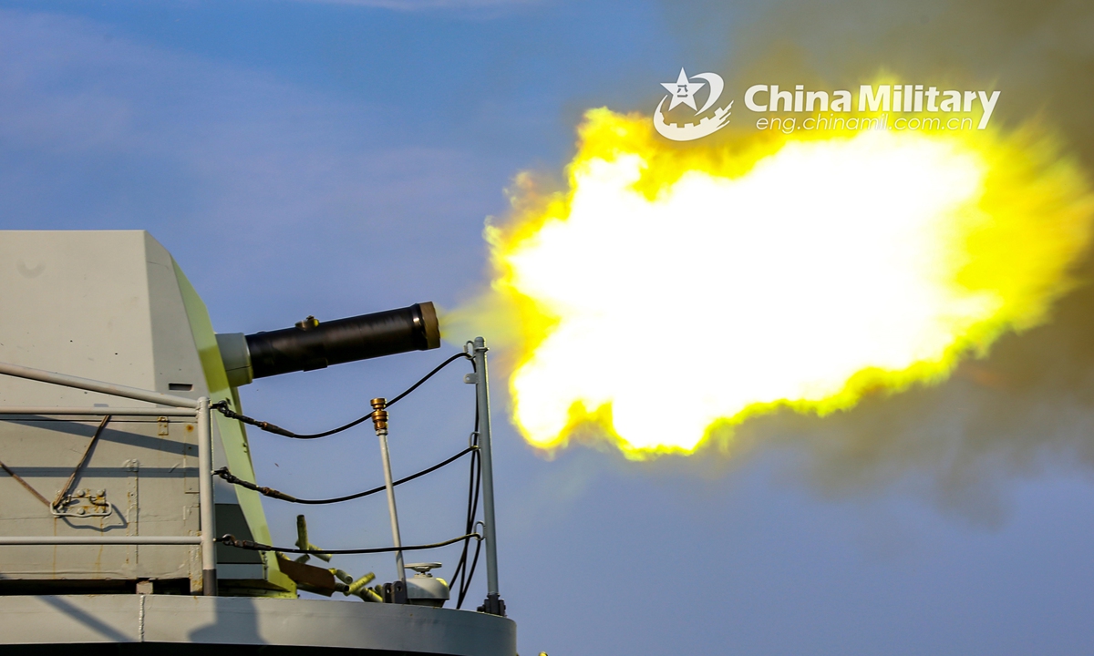 A vessel attached to a frigate flotilla with the navy under the PLA Eastern Theater Command fires its close-in weapons system at mock sea targets during a maritime live-fire training exercise in early December, 2021. (eng.chinamil.com.cn/Photo by Liu Min)