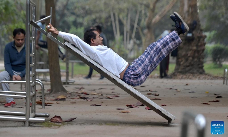 People do morning exercise at a park in Dhaka, Bangladesh, on Dec 30, 2021.Photo:Xinhua
