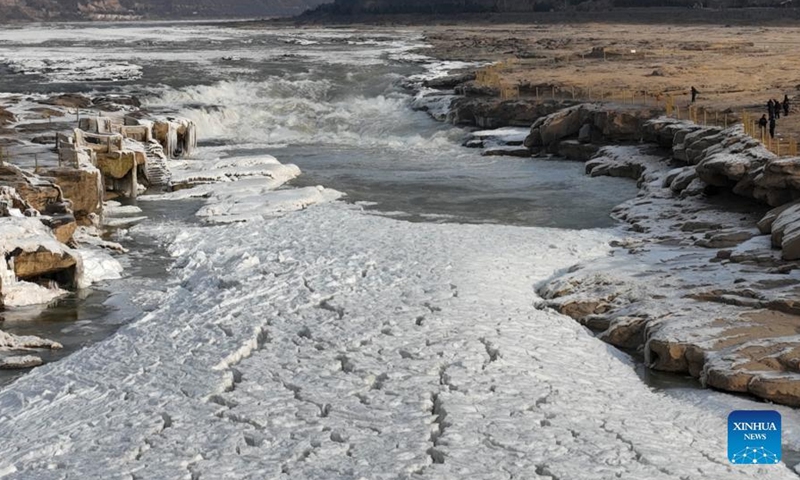 Aerial photo taken on Dec. 30, 2021 shows winter scenery of the Hukou Waterfall on the Yellow River in north China's Shanxi Province.Photo:Xinhua