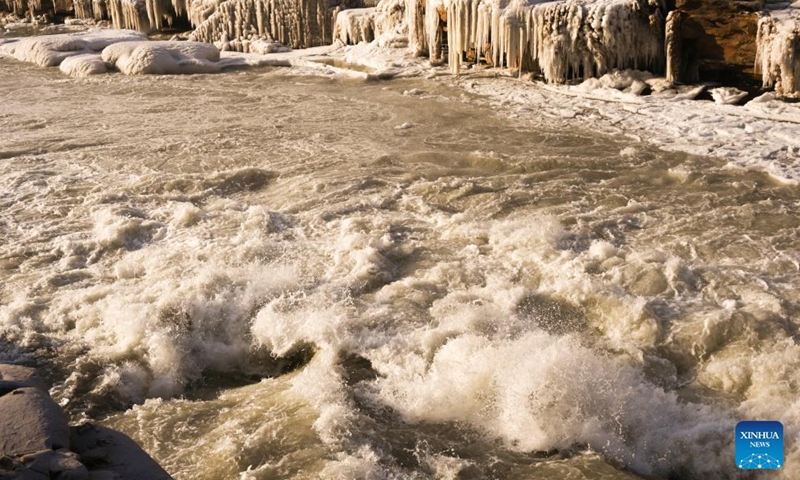 Aerial photo taken on Dec. 30, 2021 shows winter scenery of the Hukou Waterfall on the Yellow River in north China's Shanxi Province.Photo:Xinhua