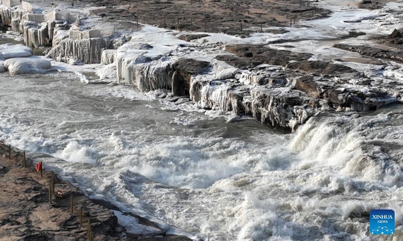 Aerial photo taken on Dec. 30, 2021 shows winter scenery of the Hukou Waterfall on the Yellow River in north China's Shanxi Province.Photo:Xinhua