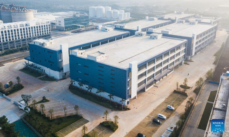 Aerial photo taken on Jan. 2, 2022 shows a factory building and overseas warehouse project at the Yangpu Bonded Port Area in the Yangpu Economic Development Zone, south China's Hainan Province.