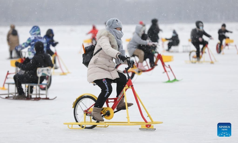 People play at a winter recreation park in Harbin, northeast China's Heilongjiang Province, Jan. 1, 2022. (Xinhua/Zhang Tao)