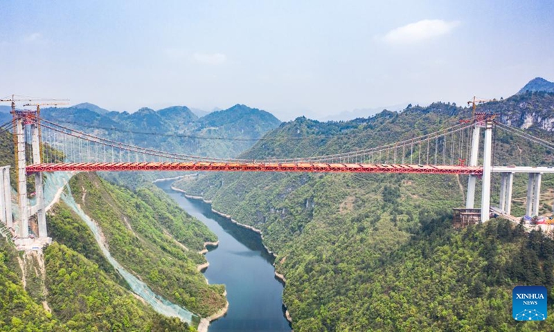 Aerial photo taken on March 27, 2021 shows the Yangbaoshan bridge of the Guiyang-Huangping expressway in southwest China's Guizhou Province. The total length of expressways in Guizhou Province exceeded 8,000 kilometers. (Xinhua/Tao Liang)