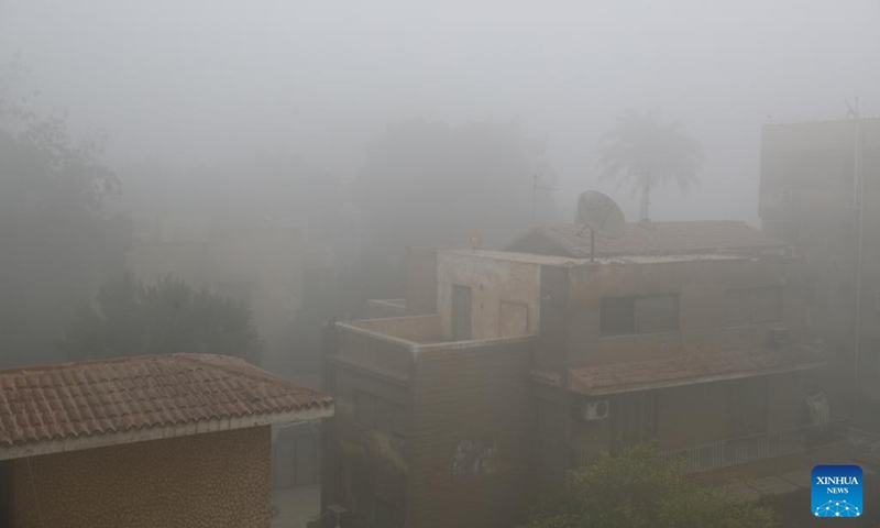 Buildings are shrouded in a heavy fog in Cairo, Egypt, Jan. 4, 2022. A heavy fog on Tuesday hit Cairo, causing poor visibility in the city.(Photo: Xinhua)