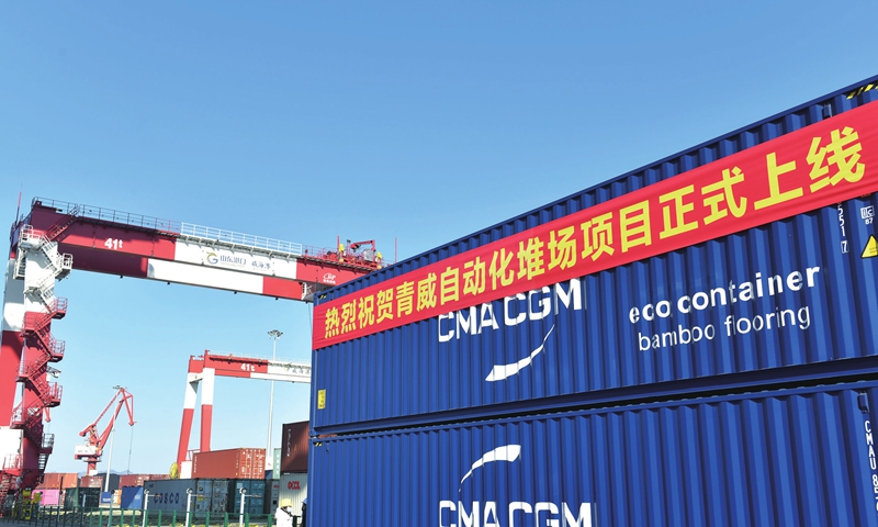 An automated container yard in Weihai port, East China's Shandong Province is up and running on January 6, 2022. The terminal is the first in Shandong to shift to full automation from traditional operations. With computer programs replacing manual operation in command and control, the yard has achieved a 39-percent increase in efficiency. Photo: cnsphoto