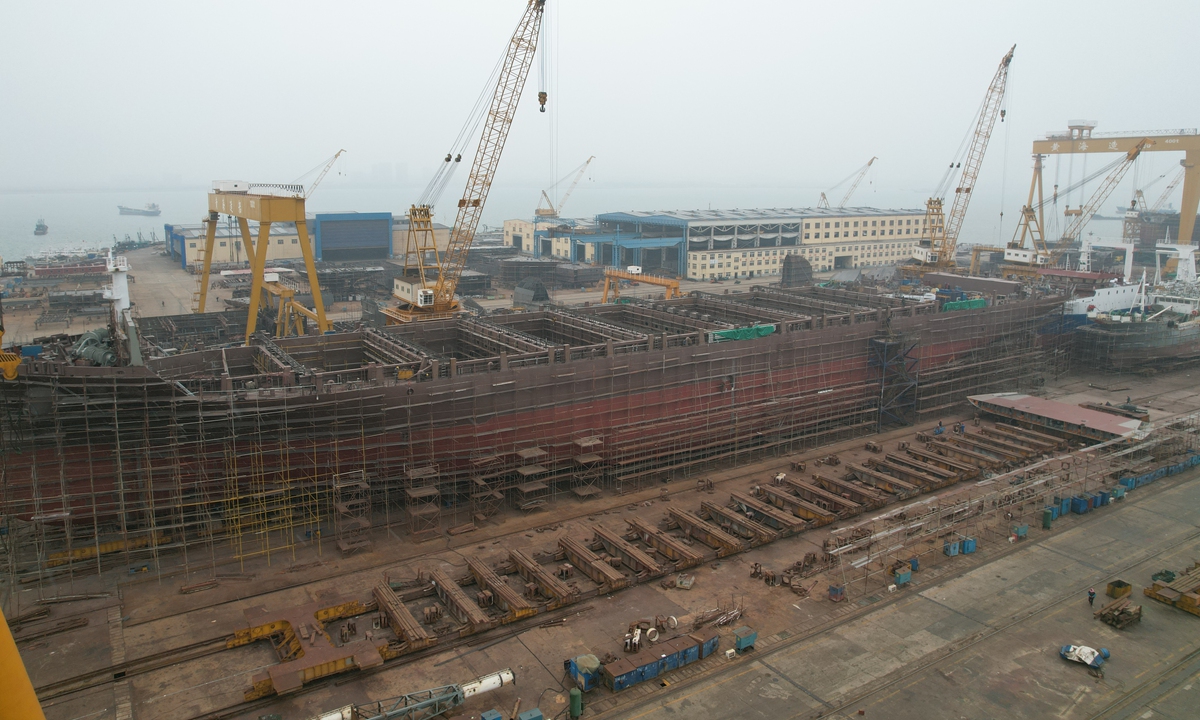 A ship is under construction in Rongcheng, East China's Shandong Province that will carry 1,800 standard containers on January 10, 2022. Ship construction is heating up at the beginning of the New Year. Photo: cnsphoto