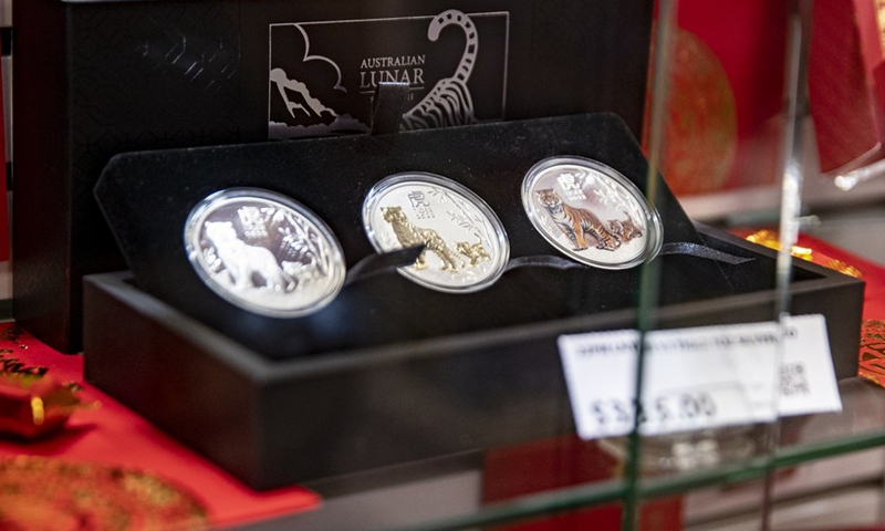 Coins for the Year of Tiger are seen in a post office in Sydney, Australia, on Jan. 14, 2022.(Photo: Xinhua)