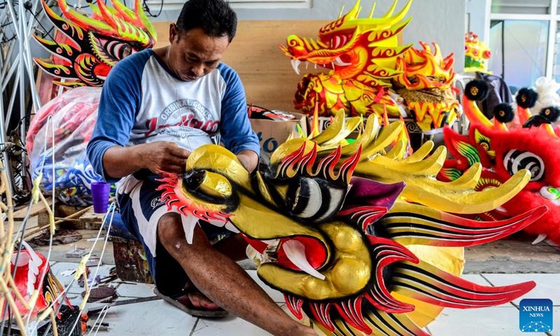 A worker makes a traditional lion head for the upcoming Chinese New Year celebration in Bogor, West Java, Indonesia, on Jan. 15, 2022.Photo:Xinhua