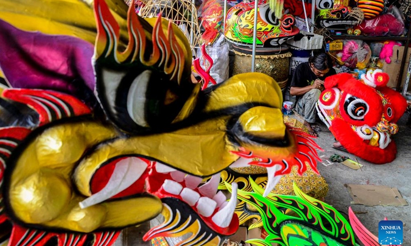 A worker makes a traditional lion head for the upcoming Chinese New Year celebration in Bogor, West Java, Indonesia, on Jan. 15, 2022.Photo:Xinhua