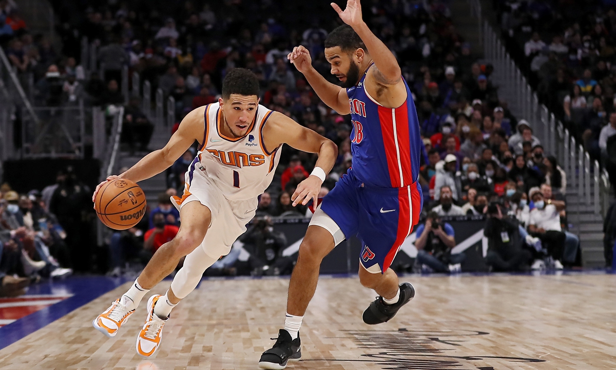 Devin Booker Stars As Suns Beat Heat To Seal NBA Playoff Berth - Global ...