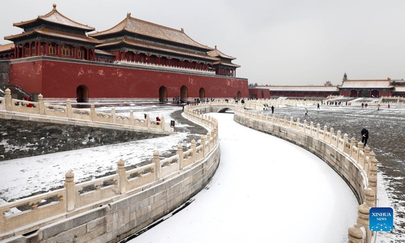 Tourists enjoy the snow scenery of the Palace Museum in Beijing, capital of China, Jan. 20, 2022. (Photo: Xinhua)