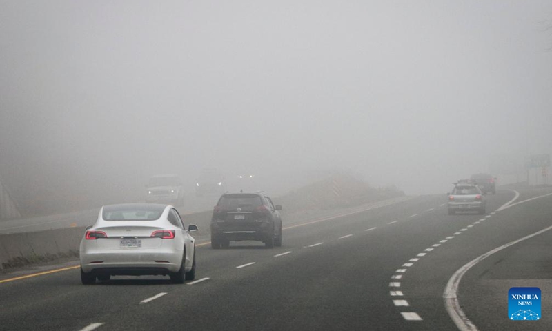 Vehicles travel along a highway under foggy condition in Vancouver, Canada, on Jan. 23, 2022.Photo:Xinhua