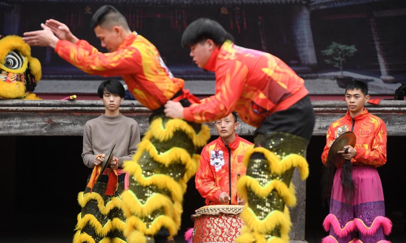 Members of a lion dance team attend a training at Qiantong ancient town in Ninghai County, east China's Zhejiang Province, Jan. 21, 2022.Photo:Xinhua