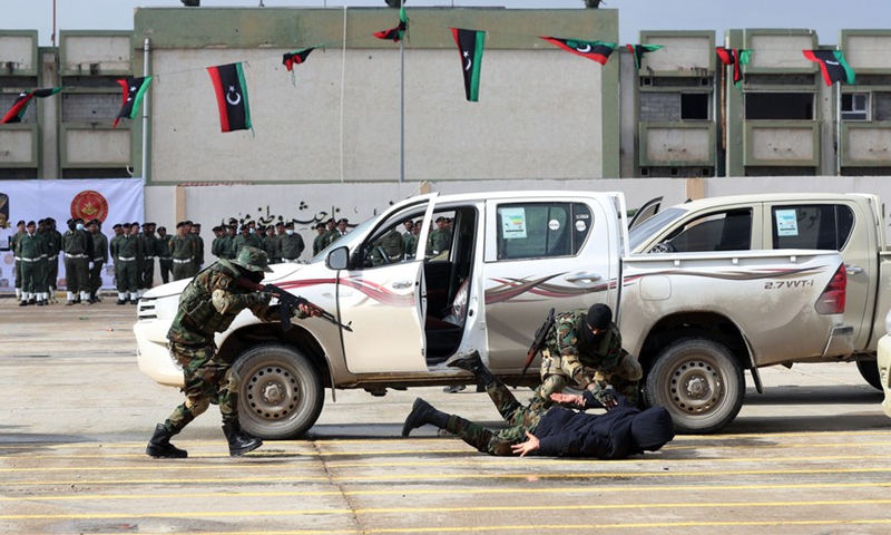 Soldiers show their skills during a graduation ceremony in Tripoli, Libya, on Jan. 23, 2022.(Photo: Xinhua)