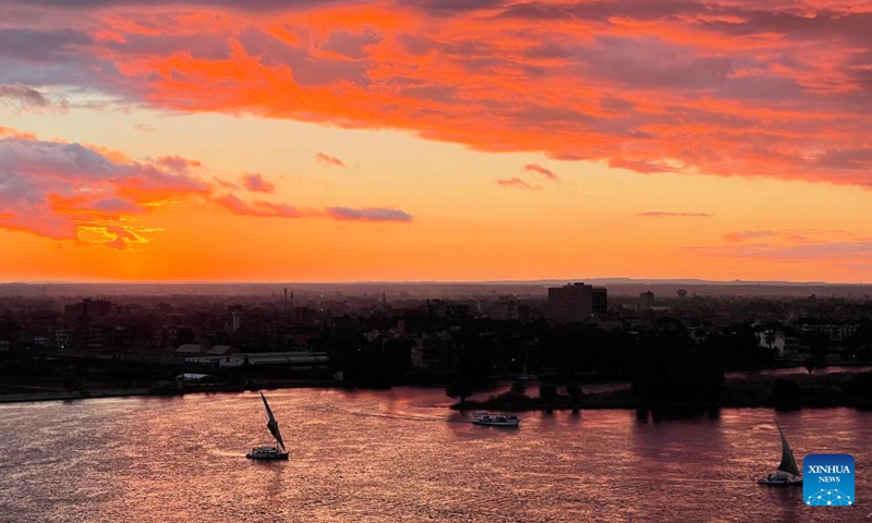 Flaming clouds are seen at sunset in Cairo, Egypt, on Jan. 26, 2022.Photo:Xinhua