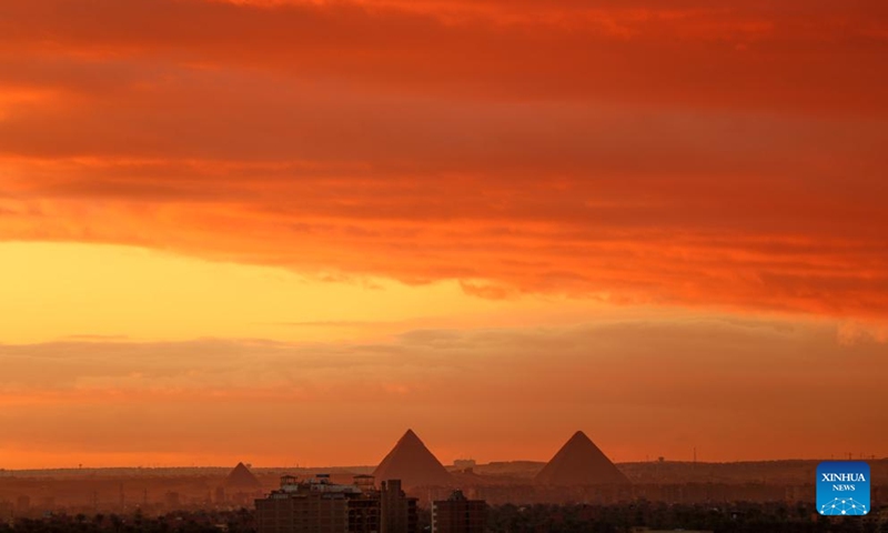 Flaming clouds are seen at sunset in Cairo, Egypt, on Jan. 26, 2022.Photo:Xinhua