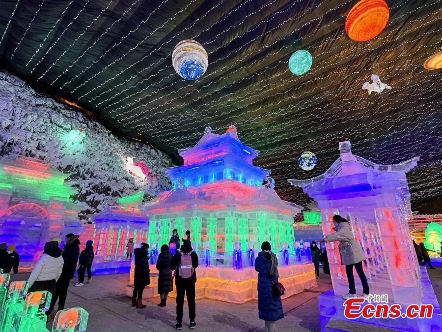 Tourists enjoy ice lanterns in Longqingxia of Yanqing District in Beijing, capital of China, Jan 27, 2022.Photo:Xinhua